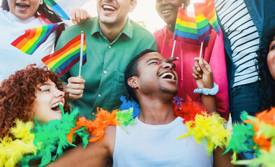 Diverse group of people having fun together, Transgender person having fun with gay friends in...
