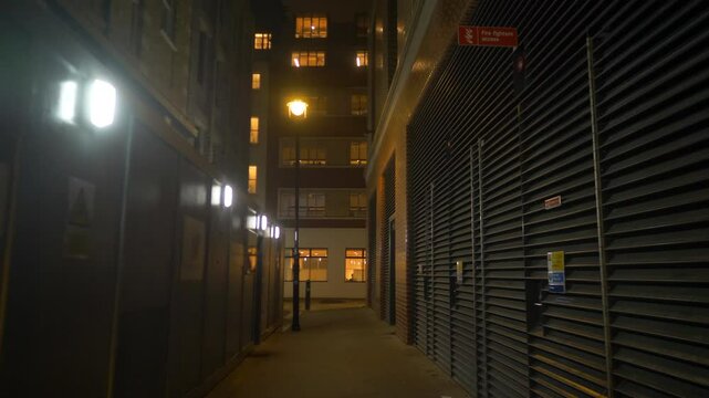 Walking Ally with Construction Boards Fluorescent Light Street Lamp Post London