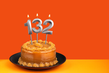 Birthday candle number 132 - Cake with dulce de leche frosting.