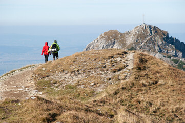 Fototapeta premium Couple Hiking on a Mountain Ridge - Zakopane Tatra Mountains