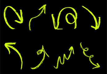 green neon grunge arrow. Set of green neon hand drawn grunge doodle spiral and curved charcoal, chalk arrows on black background. 