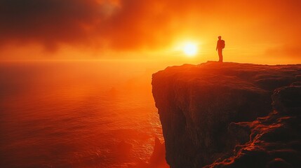 A silhouette of a hiker on a cliff at sunset, with the golden light casting long shadows on the rocky terrain. 339