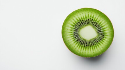 Fresh Green Kiwi Fruit Slice on White Background Ideal for Healthy Eating Concept