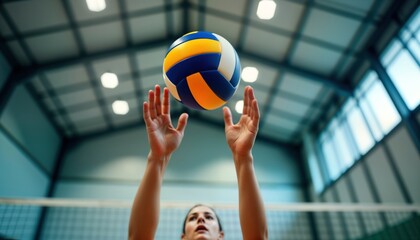 Volleyball player sets ball indoors. Player in action. Professional volleyball setting. Indoor gym setting with overhead lights. Focus on technique and skill. High-quality image.