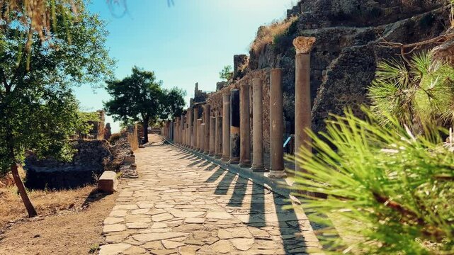 Ruins of the ancient Roman port city of Siedra in Alanya, Antalya, Turkey. The street and ruins of the ancient abandoned ancient city of Siedra on the Mediterranean coast. 4К
