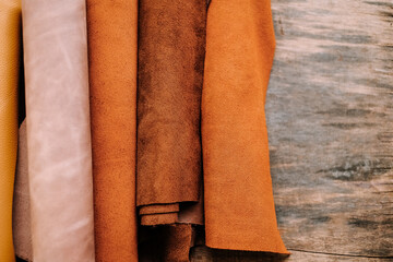 Suede Fabric Rolls. Collection of Suede Fabric Textures in Brown Tones.Textured .Variety of...