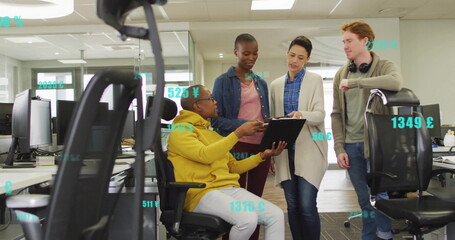 Image of financial data processing over diverse colleagues talking at casual office