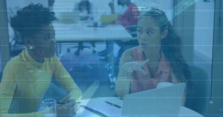 Image of financial data processing over diverse business people in office