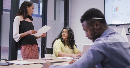 Image of financial data processing over diverse business people in office