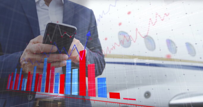 Image of financial data processing over caucasian businessman using smartphone