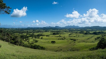 Fototapeta premium Scenic view of rolling hills on a bright day with clouds. Location or Travel