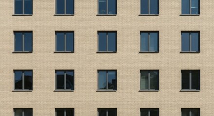 Urban building facade. Seamless pattern of a modern residential structure with rows of identical windows and a textured exterior