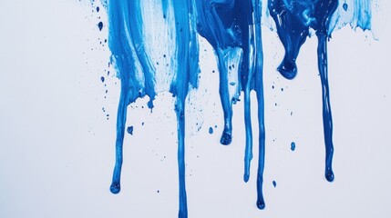 Blue paint drips on white background, abstract art texture