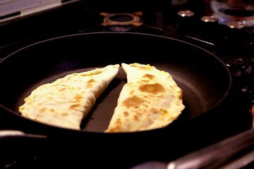 Homemade pancake. Close-up view of Turkish culinary delicacy raw pastry on plate. Traditional Turkish cuisine.
