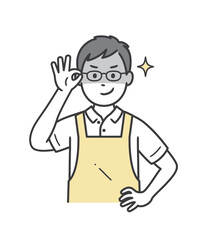 眼鏡を上げて悪巧みしてニヤける若い男性介護士