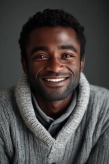 Obraz premium Portrait of a Happy Man Wearing a Grey Cardigan