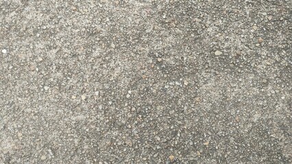 asphalt texture background. Grungy cement texture background. Spots of white paint on a gray concrete background. Grungy cement texture background. Spots of white paint on a gray concrete background