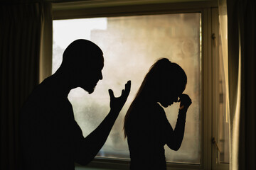 unhappy crying frightened woman, aggressive man quarreling at home. Angry husband emotionally arguing screaming shouting to scared wife psychological emotional abuse, domestic violence relationship 