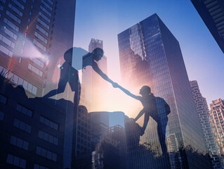 Teamwork, unity, life goals and self improvement concept. Man helping his friend climbing partner up a steep edge of a mountain, People showing kindness in the city 