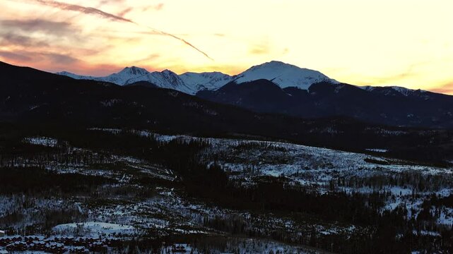 Vasquez Cirque Byers Parry Peak Winter Park resort orange sunrise sunset Fraser Colorado aerial drone USA Rocky Mountains national forest trails high alpine Berthoud Pass winter solstice upwards