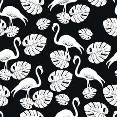 white flamingo tropical pattern on dark background