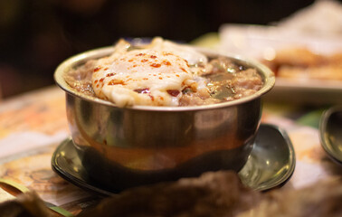 Minced beef with over-medium egg over rice - Hong Kong style. Sham Shui Po, Hong Kong. Selective focus, blurred background