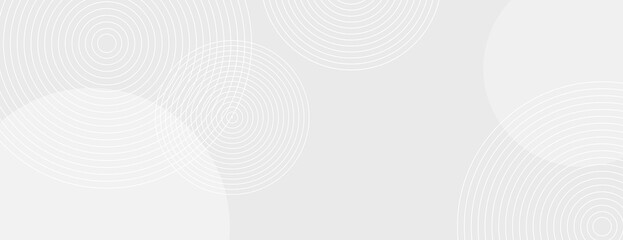 Gray background with circular patterns. The background is light gray with a smooth texture, featuring gray concentric circles. Circle pattern background vector. White background.