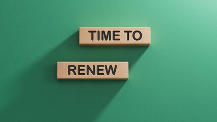 wooden cubes with TIME TO RENEW . Tax planning and budgeting concept. Wooden cube blocks. Copy space.3D rendering on green background.