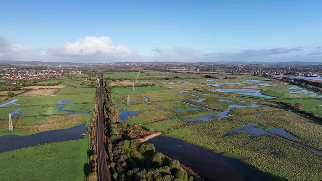 Wetlands and Marshes in RSPB Exminster and Powderham Marshe from a drone, Exeter, Devon, England