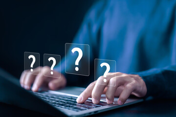 Question marks are shown on a laptop, and question tech Brainstorming and problem-solving are the concepts of asking, answering, business FAQ, thinking, and wondering.