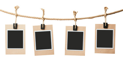 blank photo frames on rope isolated on transparent white background, clipping path