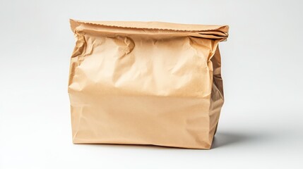 Obraz premium Brown paper bag isolated on white background, full depth of field