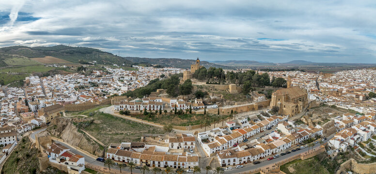 Antequera medieval town in Andalusia Spain with huge Arab castle on the hill, city walls and white wall houses