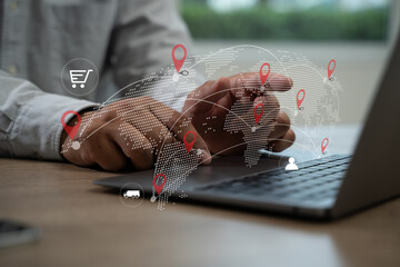Logistic import export  man is using a laptop with a map of the world on the screen Logistics and...