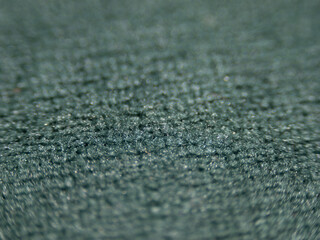 The image is of a carpet with a blue and green color