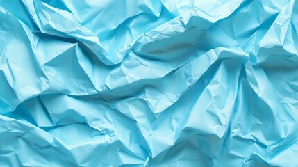 Fototapeta premium Abstract texture of crumpled blue paper