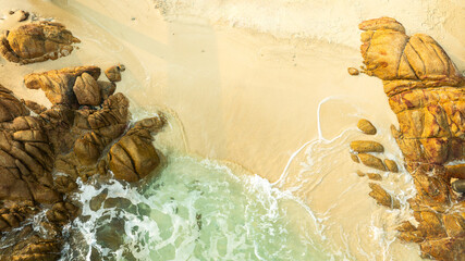 Nature of the beach and sea Summer with sunshine, sandy beaches, clear blue waters sparkling against the blue sky. On an island with good ecology and environment Background for summer vacation concept
