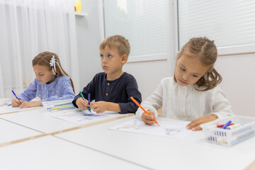 Fototapeta premium children with a teacher at a kindergarten class