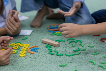 Fototapeta premium children with a teacher at a kindergarten class
