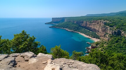 Dramatic Cliffside View Overlooking Rocky Beaches and Crystal Clear Waters on a Sunny Day
