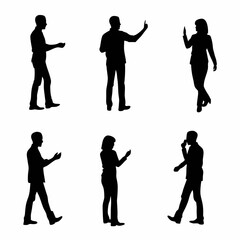 A man and a woman are standing close to each other. The man is holding a white object in his hand and pointing towards the woman. The woman is looking at the man with a smile on her face