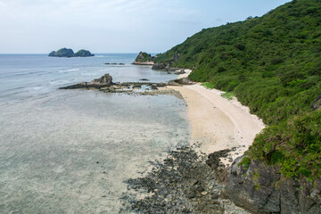 Obraz premium Photographing the spring seaside of Aka Island, Zamami Village, Okinawa Prefecture, Japan with a drone