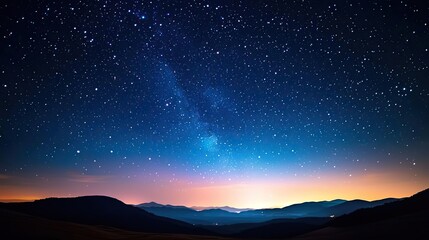Fototapeta premium Starry watercolor idea. Stunning night sky filled with stars and a colorful horizon over majestic mountains.
