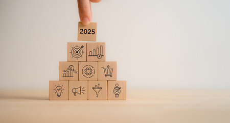 2025 business planning. Marketing and business strategy, goals and achievement concept. Wooden...