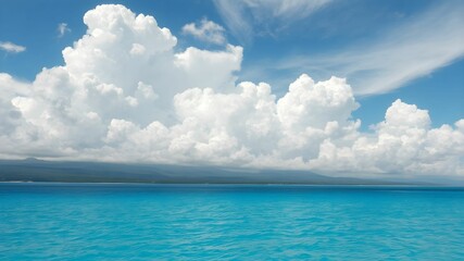 tropical beach with turquoise water and white clouds in the blue sky