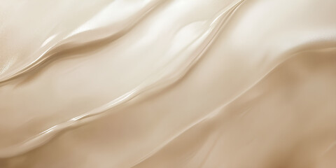 Soft silky fabric with smooth golden waves and a light pink satin texture creating a luxurious flowing design