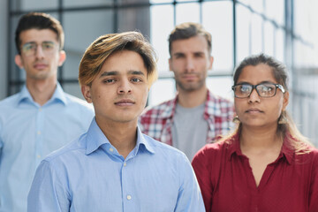 Obraz premium Confidence is a wonderful thing. Cropped portrait of a diverse group of corporate businesspeople standing with their arms folded in the office.