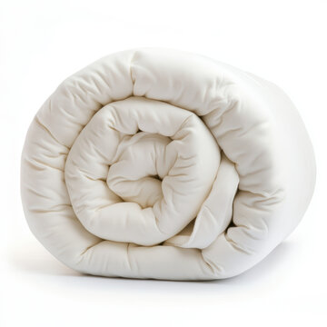 Cozy rolled white comforter showcasing soft texture and elegant bedding essentials for a peaceful sleep