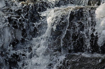 water flowing from a waterfall