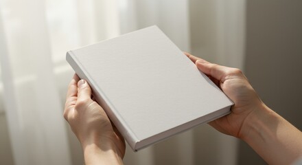 Hands holding open and closed book mockup